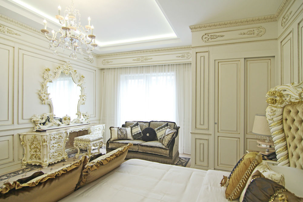 比什凯克猎户座酒店 外观 照片 A bedroom